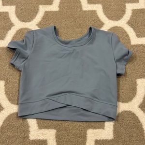 light blue/aqua athletic crop top